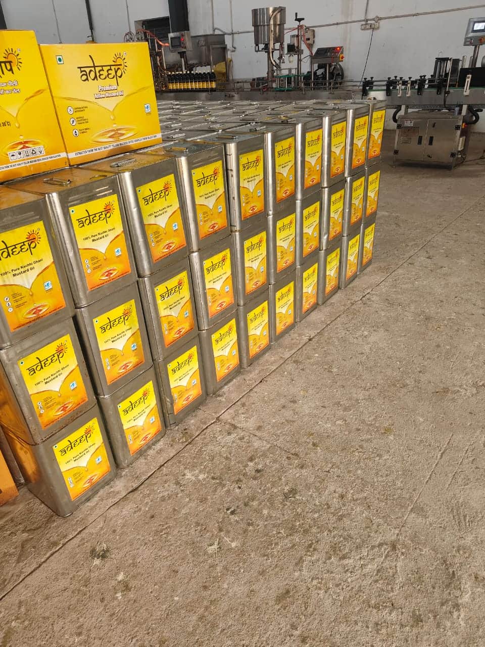 adeep tins in front of the filling line at the Farming Wagon plant